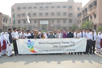 02--VC KMU Prof. Dr. Arshad Javaid along with others during a walk on World Occupational Therapy Day (Custom)1572411563.JPG