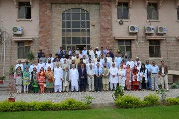 03.Group Photo of Prof Arshad Javed VC KMU along with Prof Daud Khan  andProf Hafizullah Ex VCs  and staff of KMU during Welcome party (Custom)1501818081.JPG