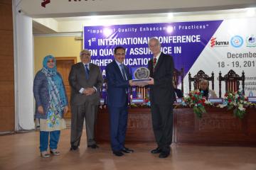 04- VC KMU Prof. Dr Arshad Javaid presented shield to Dr. Heinz Ulrich Schmidt special representative for Internal business Administeration Accreditation (FIBAA) (Custom)1513657699.JPG