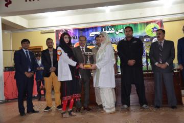 07-Vice Chancellor KMU & D.G Sports presenting cups to candidates (Custom)1514868434.JPG
