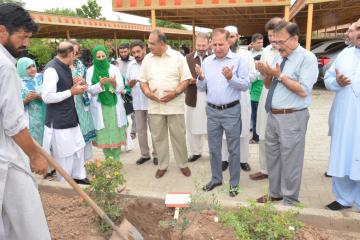 3.VC KMU Dr Arshad Javaid offering dua during  opening ceremony of tree plantation compaign at KMU (Custom)1534403633.JPG
